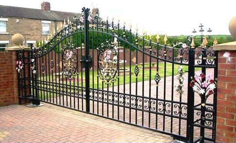 Ornate wrought iron estate entry gate