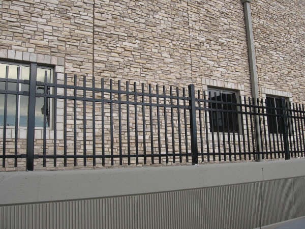 Ornamental steel security fence on commercial building