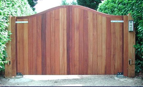 Custom arched wooden driveway gate